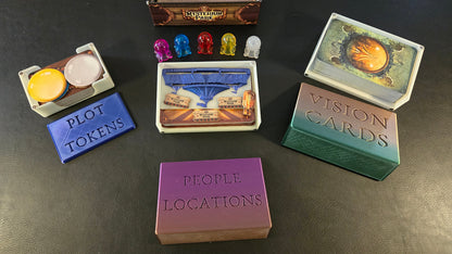 Collection of game components including plot tokens, vision cards, and people/locations cards on a dark surface.
