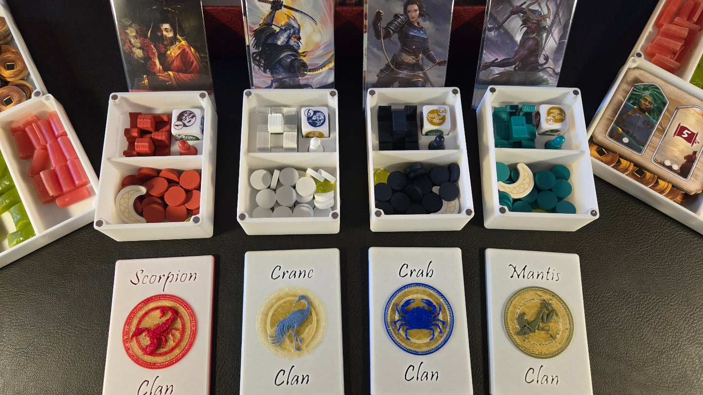 Board game components including cards and dice on a dark surface
