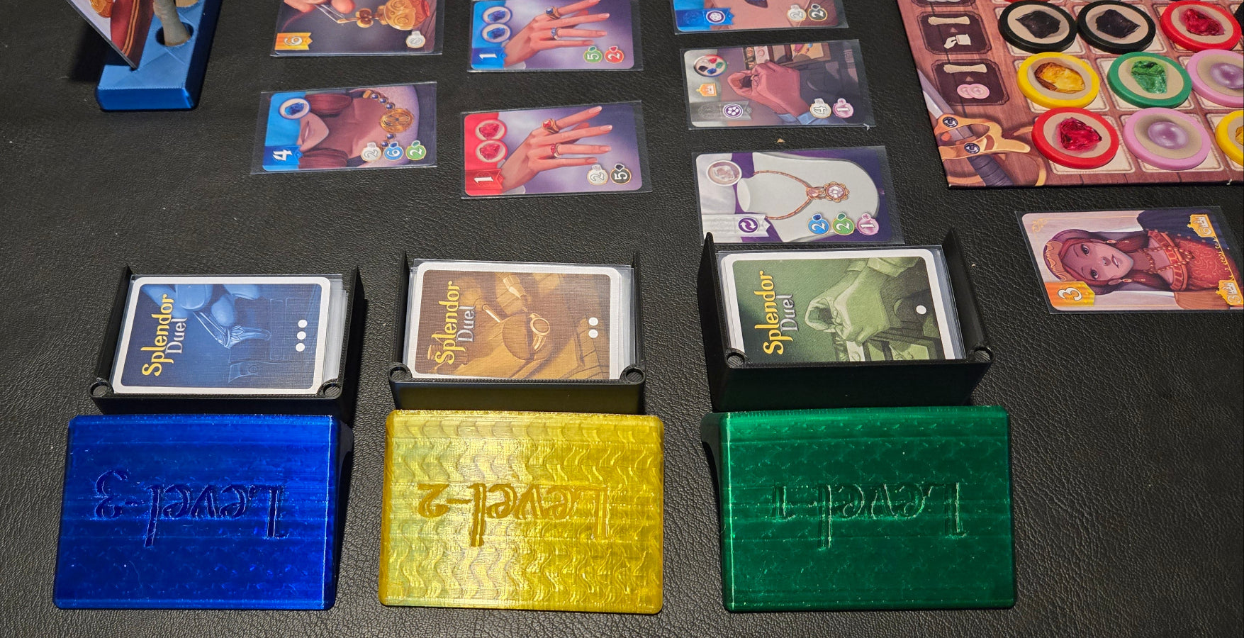 Collection of cards and card holders on a dark surface