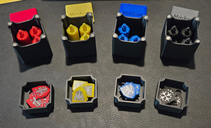 Small mechanical keyboard switches on a dark surface with a Spudger tool in the background.