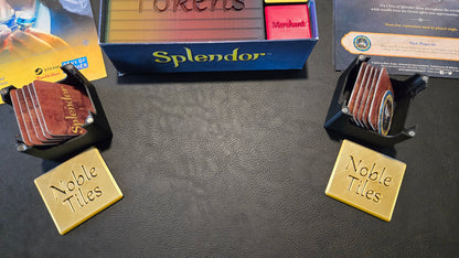 Noble Tiles with 'Splendor' game components on a dark surface