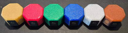 Colorful game pieces on a dark surface with 'Splendor' branding in the background.